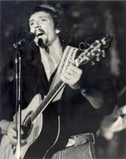 Tommy playing at On Stage circa Woody Guthrie llok