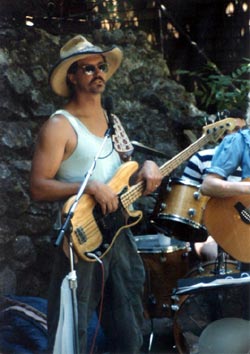 Tommy playing bass on break